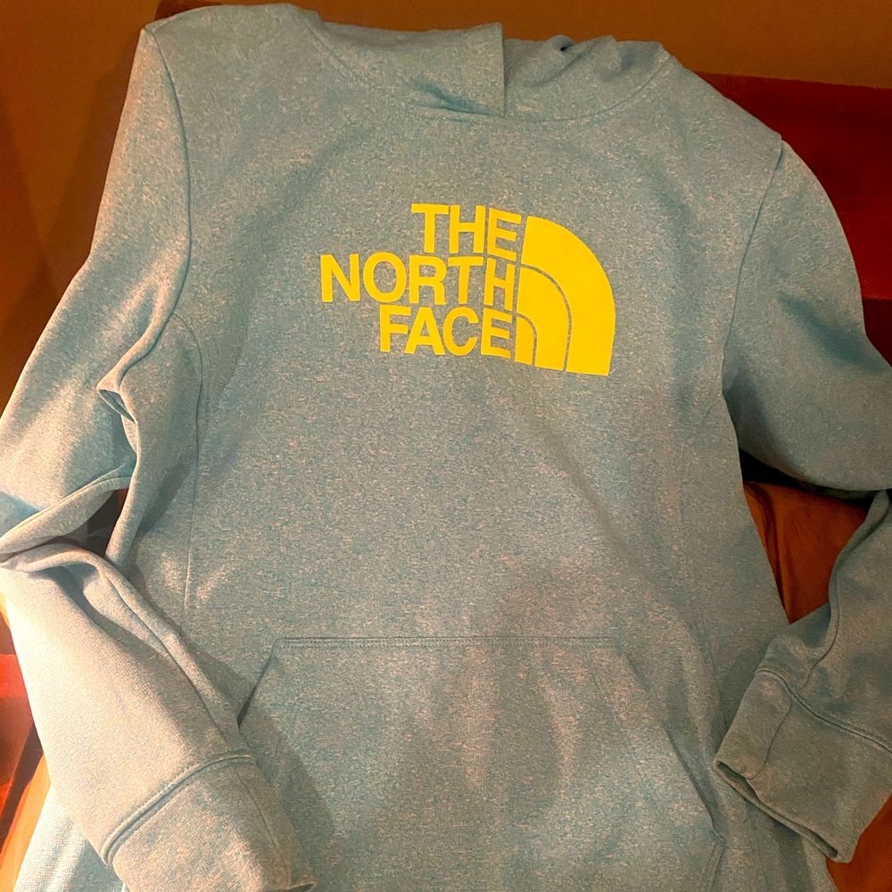 North face turquoise sweatshirt.